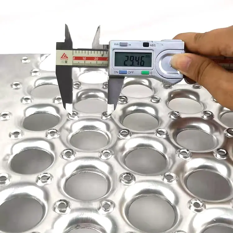 Galvanized punched anti-skid plate for safety passage stairs and treads