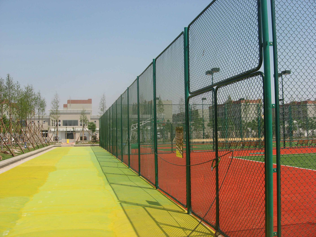 The chain link fence at the stadium The chain link fence at the stadium