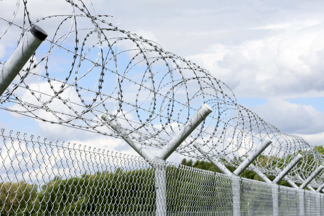 Galvanized Razor Wire Barbed Wire Coils Security Wire Fence